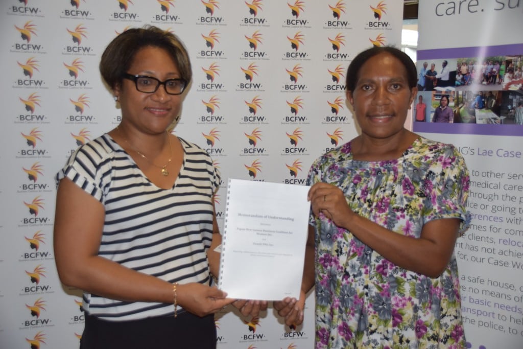 BCFW Chairperson Lesieli Taviri and Femili PNG Operations Manager Denga Ilave with the signed MOU