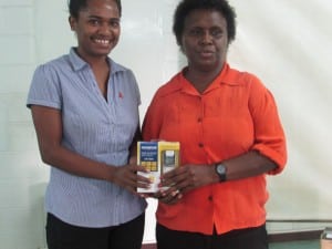 Morobe province welfare officers with the new voice recorder donated to them by Femili PNG