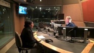 Denga speaking on Radio Australia's Pacific Beat, with Richard Ewart.